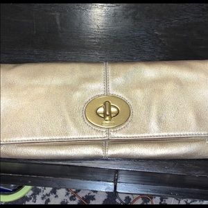 Coach Gold Bi-fold clutch